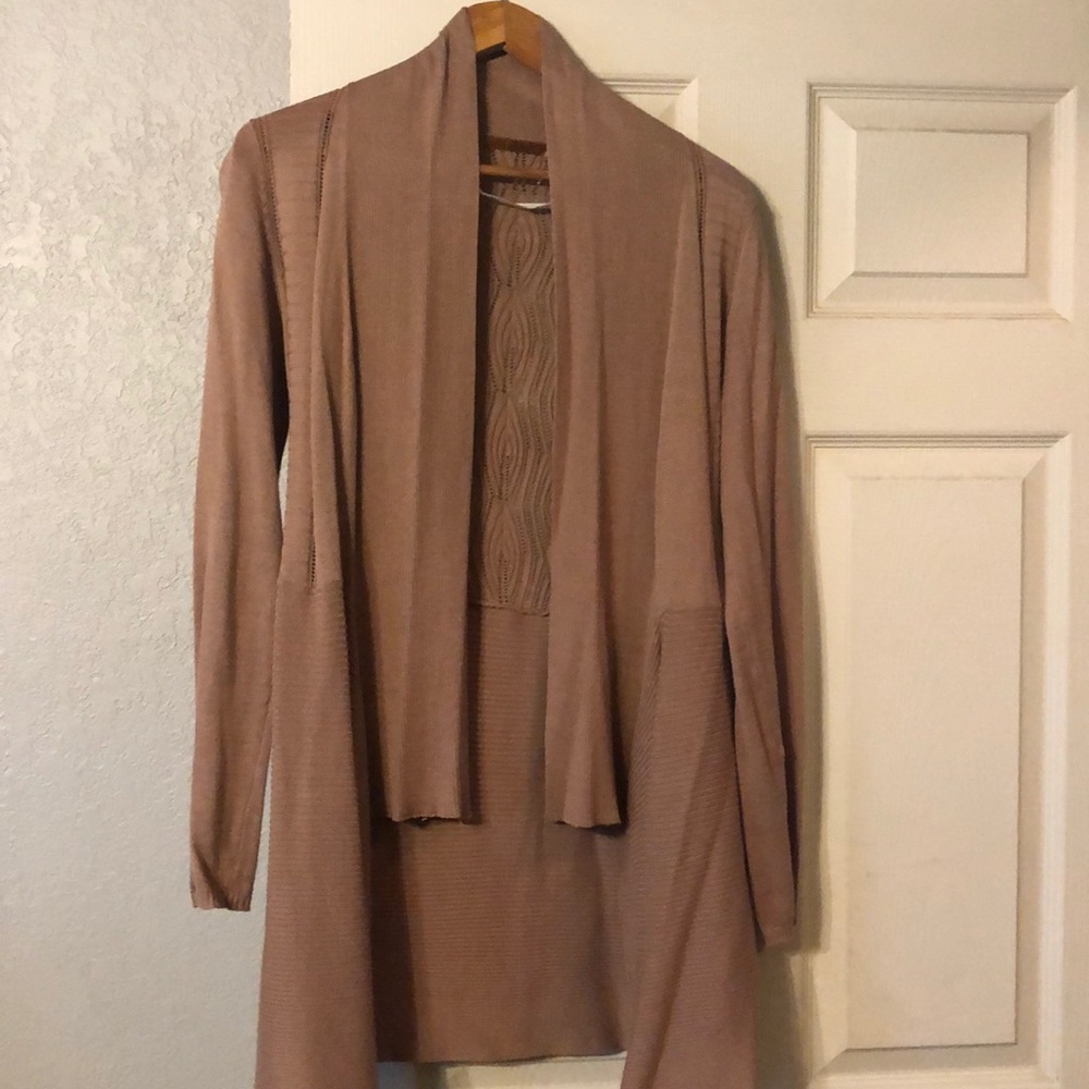 Short front long back sweater
